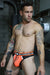 BREEDWELL Snax Thong Flex Mesh 3 - D Rubberized Text Neon Orange 16 - SexyMenUnderwear.com