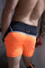 BREEDWELL Swimwear AKIRA Blacklight UV Reflective Neon Orange Swim Shorts - SexyMenUnderwear.com