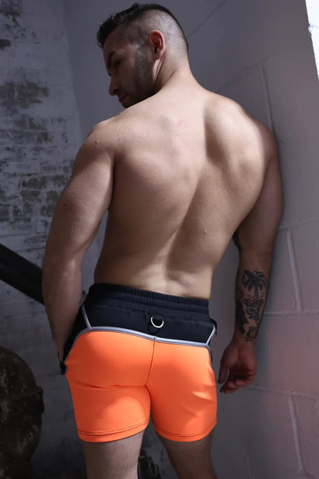 BREEDWELL Swimwear AKIRA Blacklight UV Reflective Neon Orange Swim Shorts - SexyMenUnderwear.com