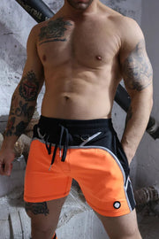 BREEDWELL Swimwear AKIRA Blacklight UV Reflective Neon Orange Swim Shorts - SexyMenUnderwear.com