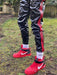 MR. RIEGILLIO PVC Tracksuit Pants With Two Side Pockets & Red Stripes - SexyMenUnderwear.com